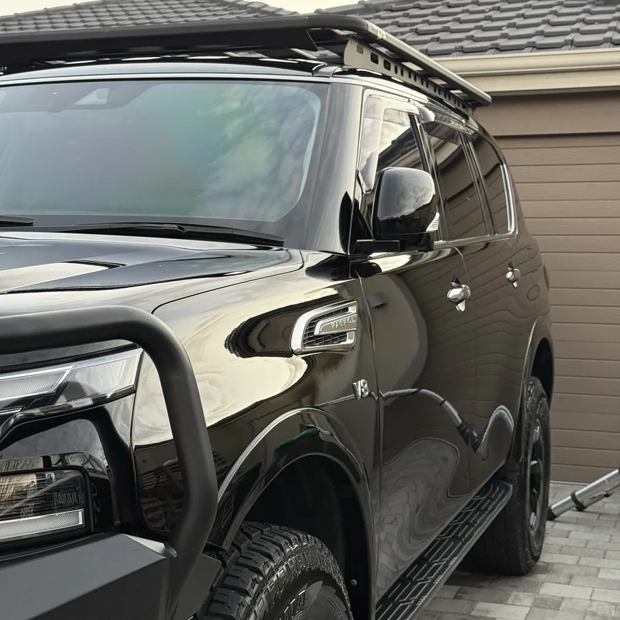 Ceramic coating result black Nissan Patrol side profile Perth